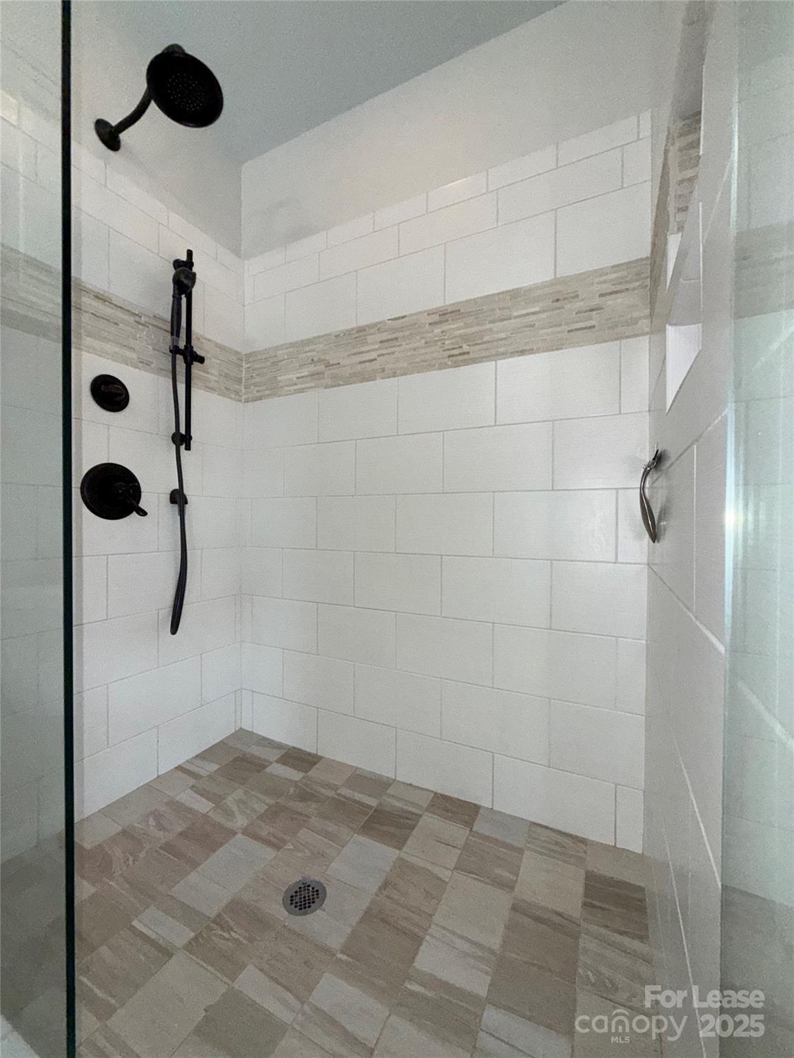 1133 Torrence Circle Davidson, NC 28036 - Photo 11 of 43 a bathroom with a shower