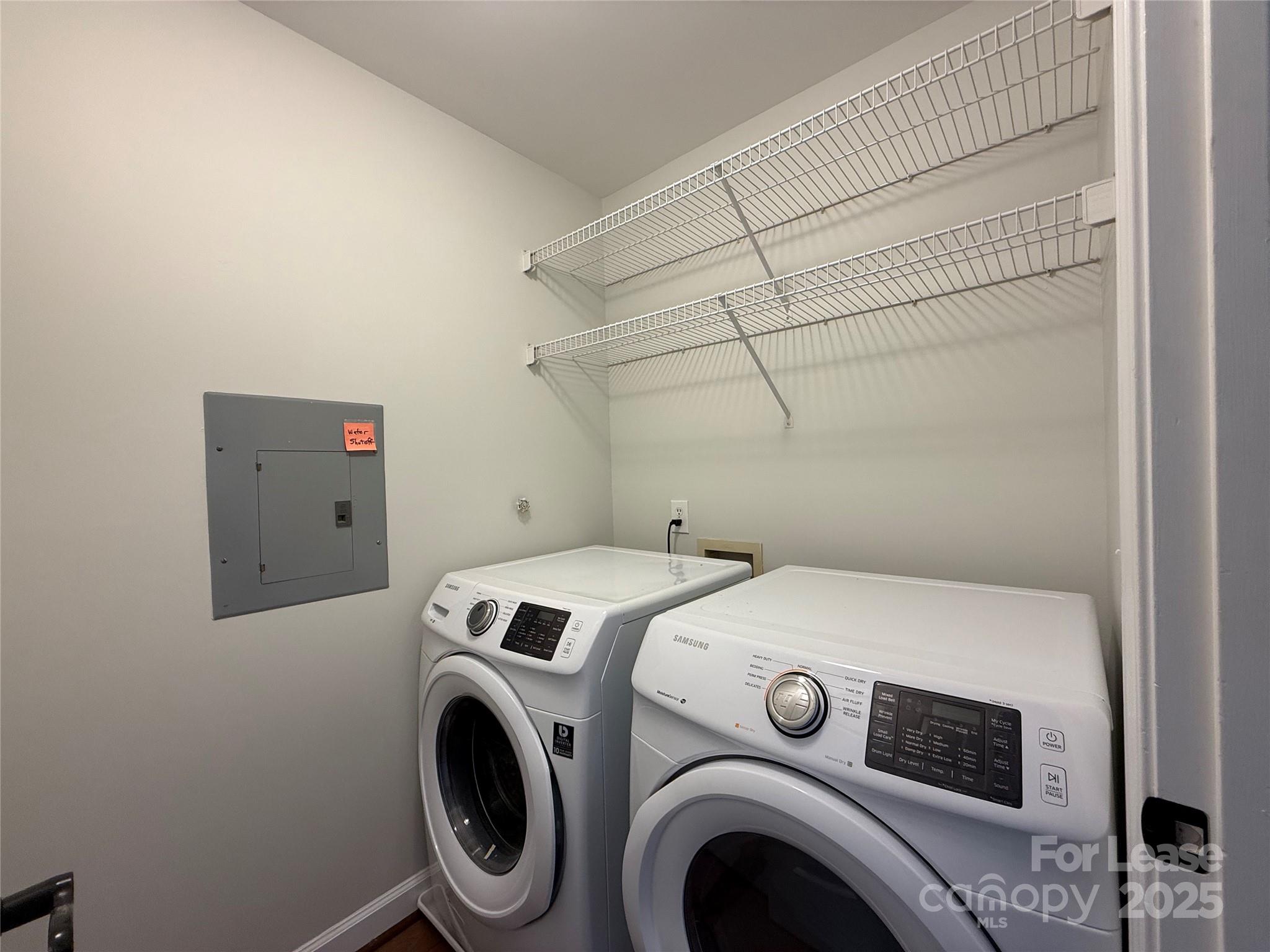 1133 Torrence Circle Davidson, NC 28036 - Photo 23 of 43 a utility room with dryer and washer