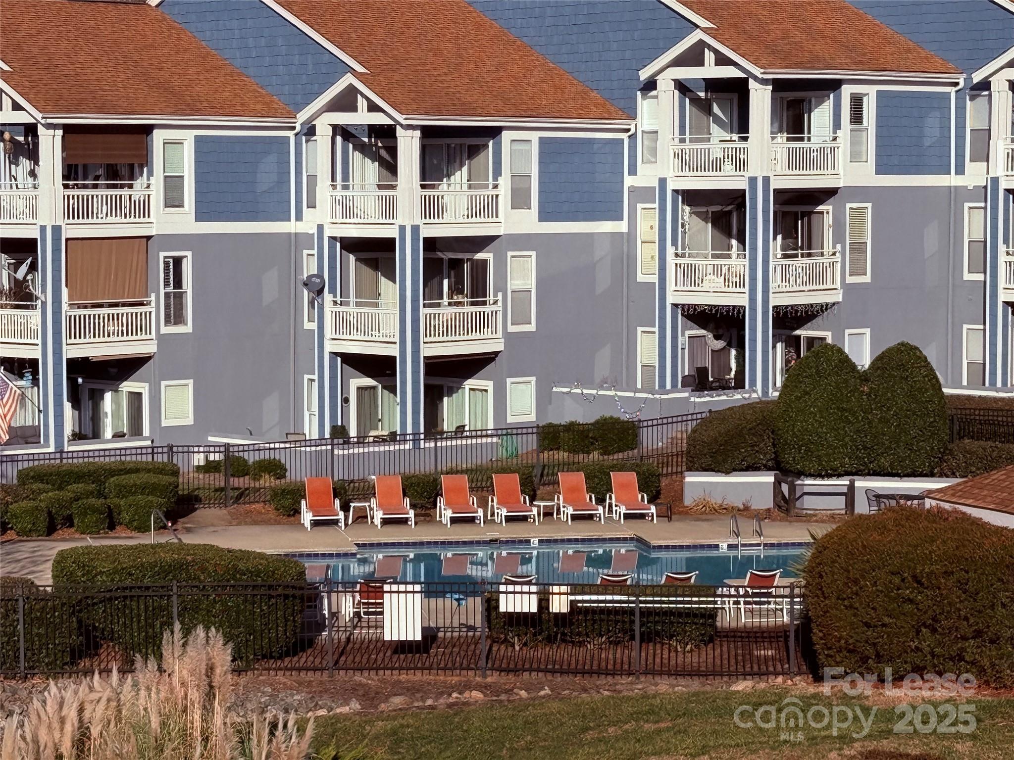 1133 Torrence Circle Davidson, NC 28036 - Photo 37 of 43 a view of a building with sitting area