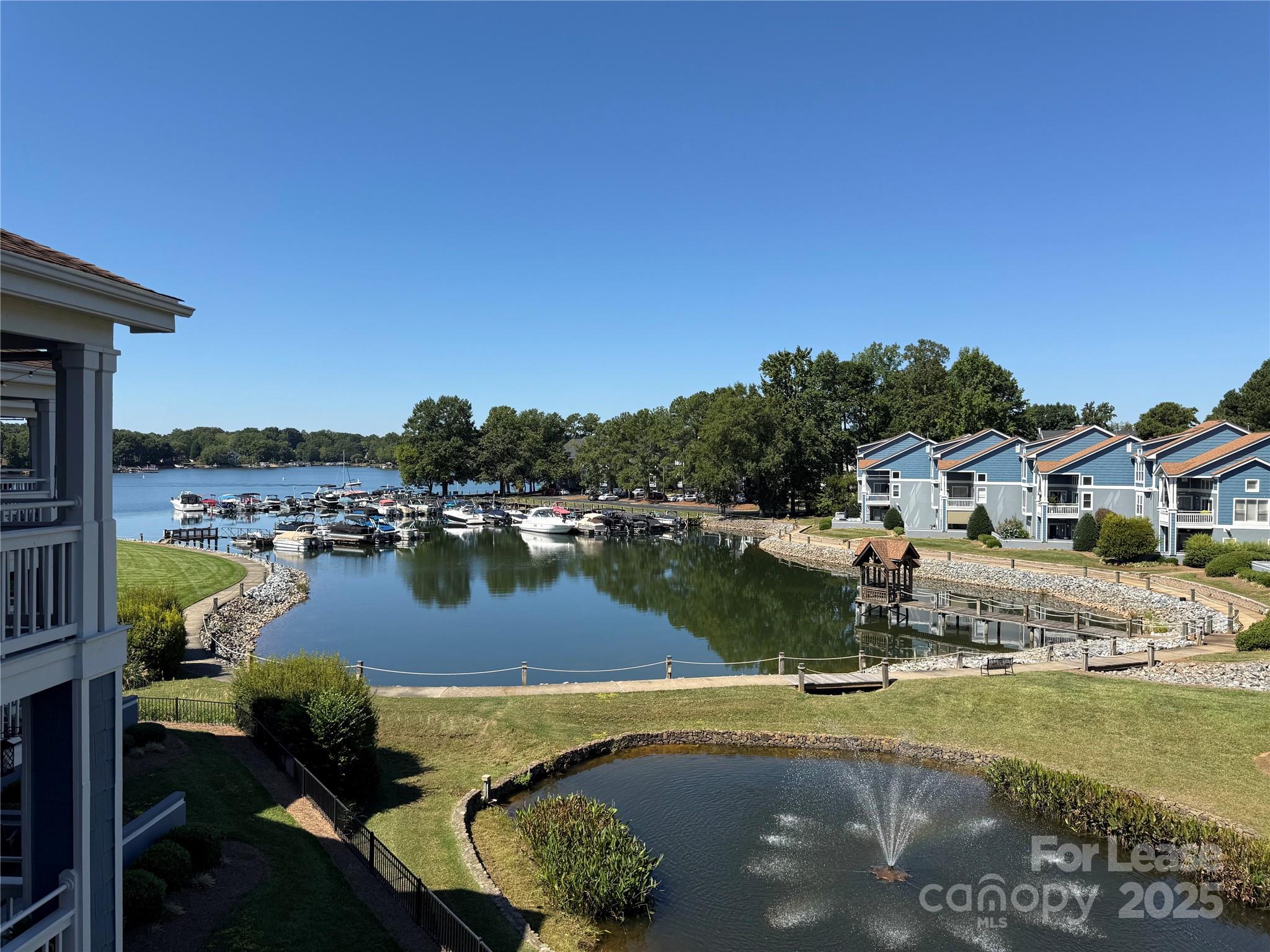 1133 Torrence Circle Davidson, NC 28036 - Photo 39 of 43 a view of a lake with house