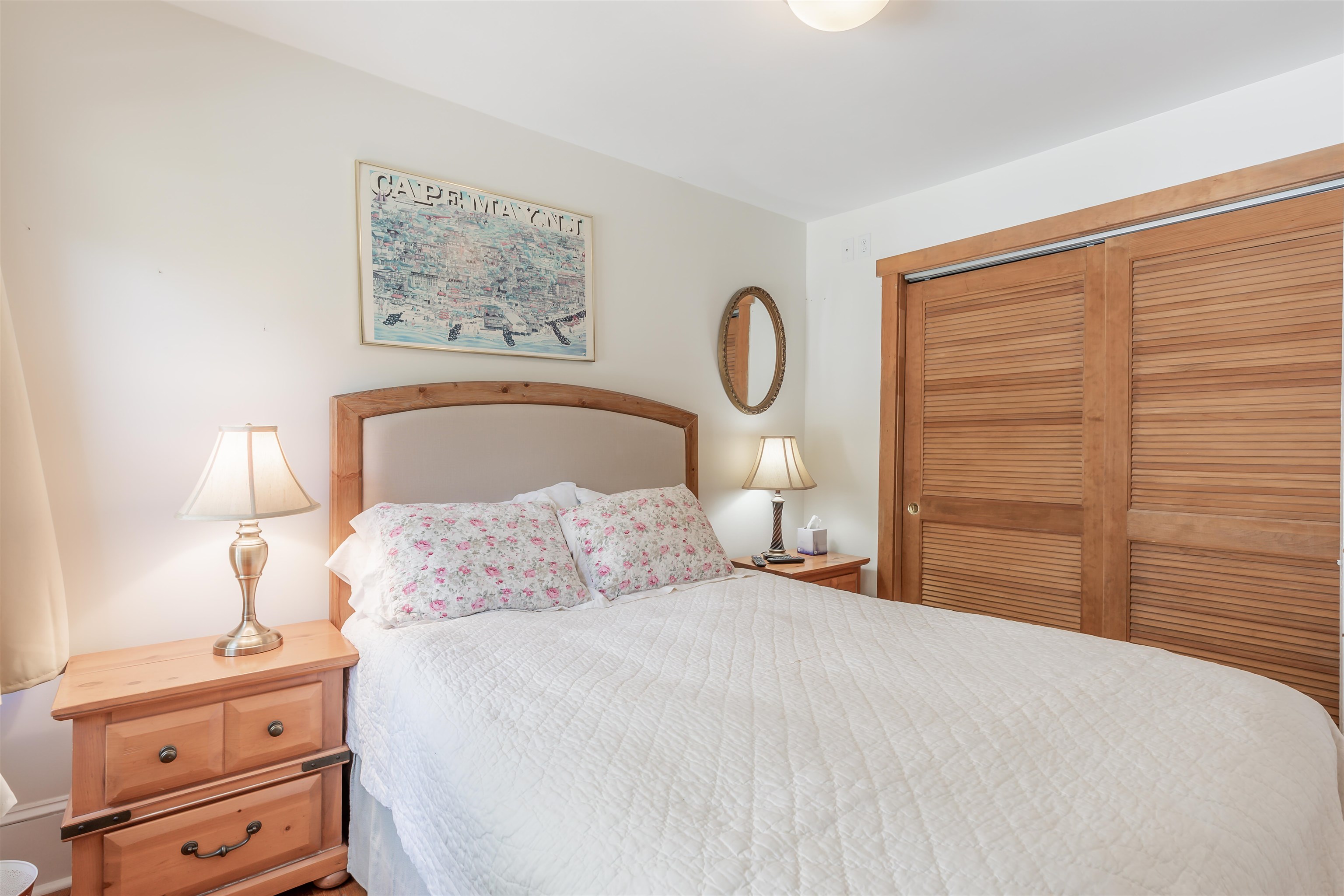 1013 Seashore Road Cape May, NJ 08204 - Photo 17 of 44 a bedroom with a bed and a closet