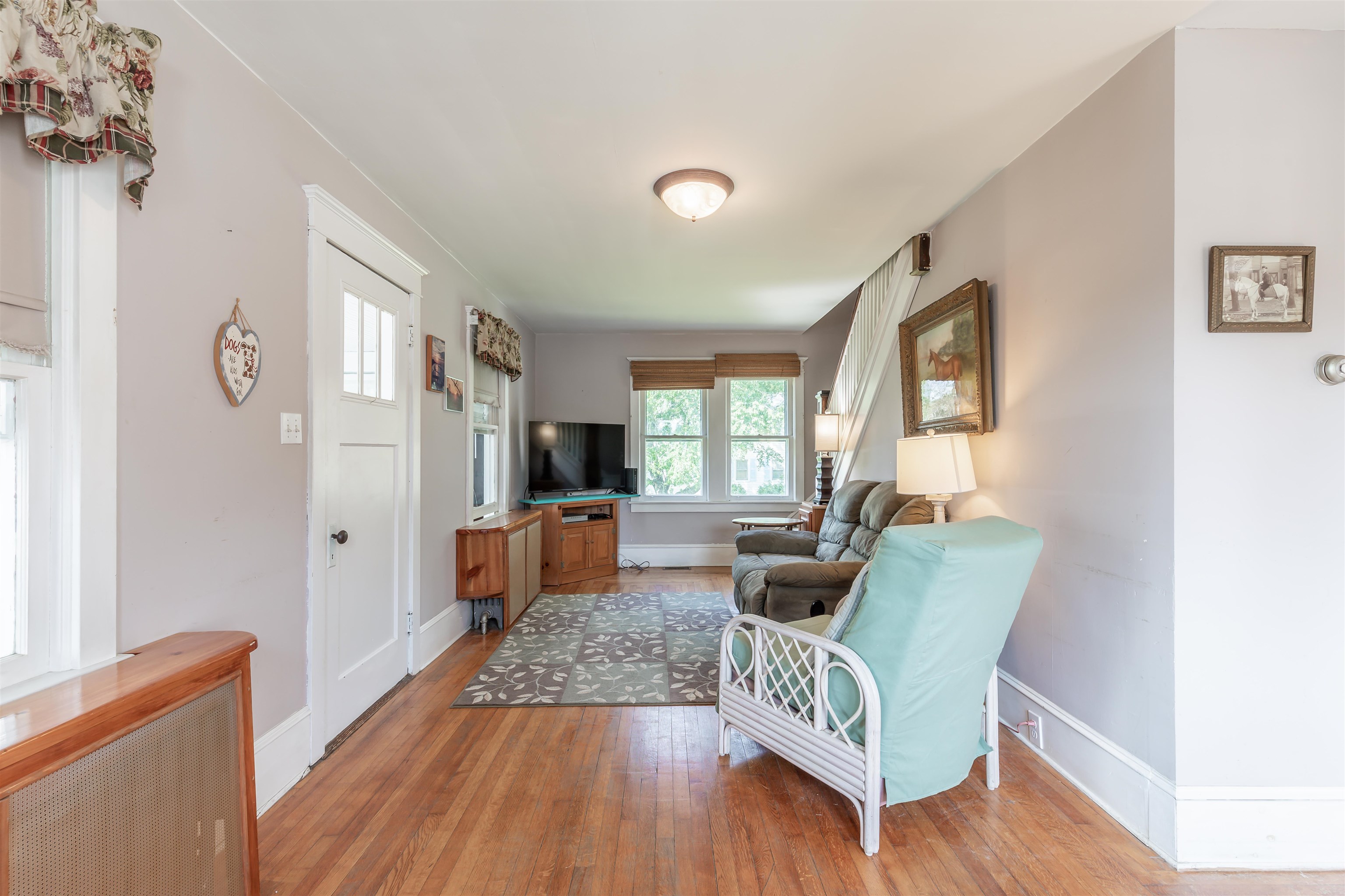 1013 Seashore Road Cape May, NJ 08204 - Photo 23 of 44 a living room with furniture and a wooden floor