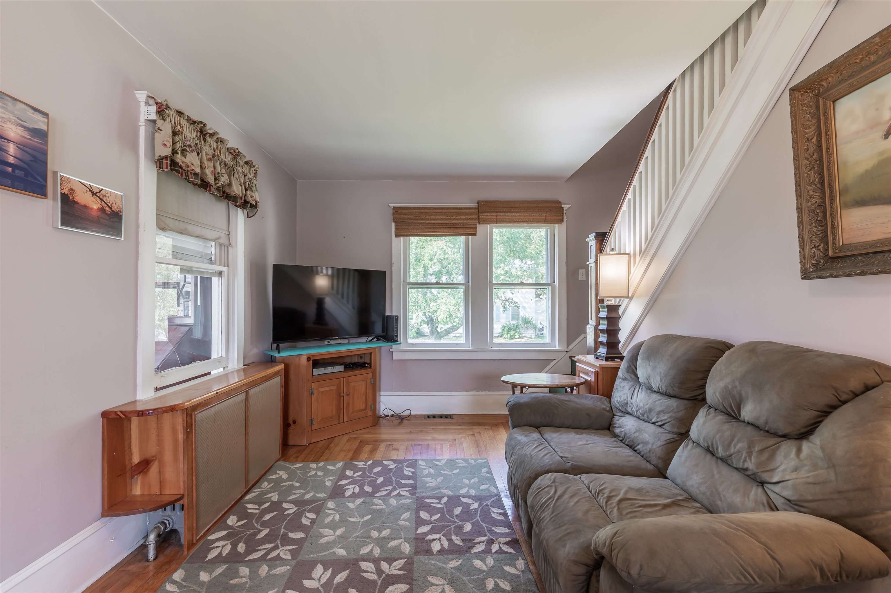 1013 Seashore Road Cape May, NJ 08204 - Photo 24 of 44 a living room with furniture and a flat screen tv