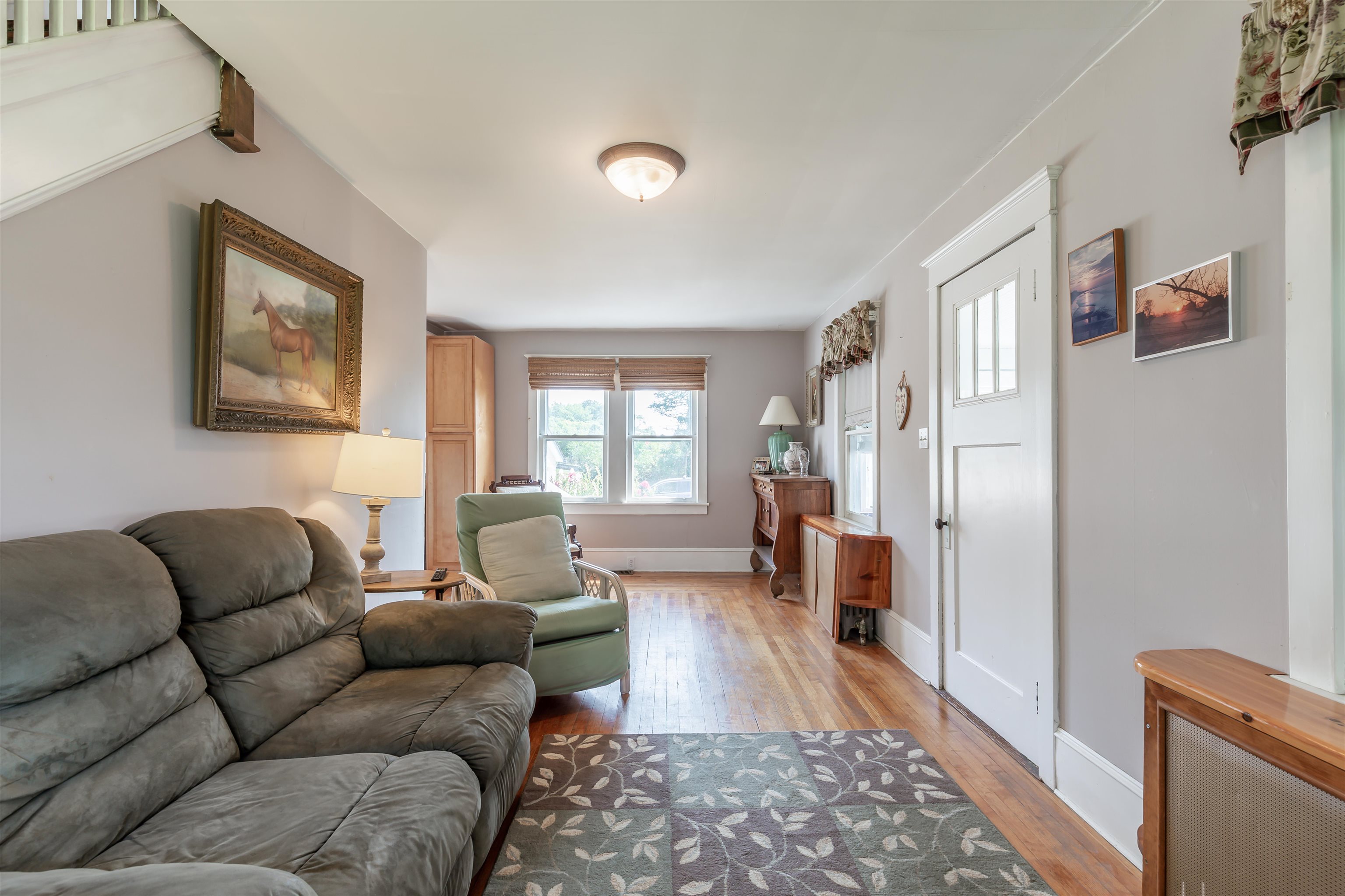 1013 Seashore Road Cape May, NJ 08204 - Photo 25 of 44 a living room with furniture and a rug