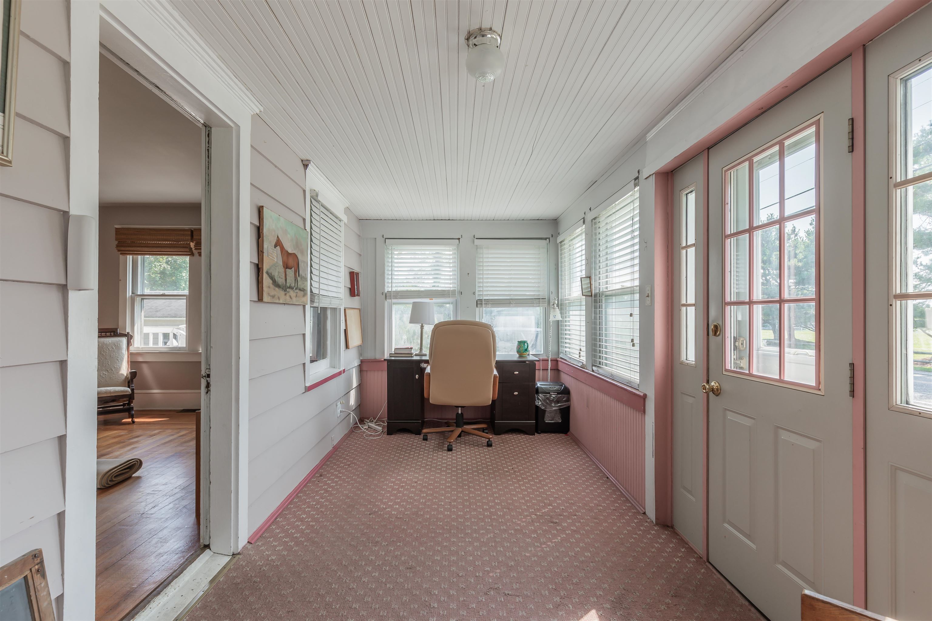 1013 Seashore Road Cape May, NJ 08204 - Photo 26 of 44 a living room with furniture and a window