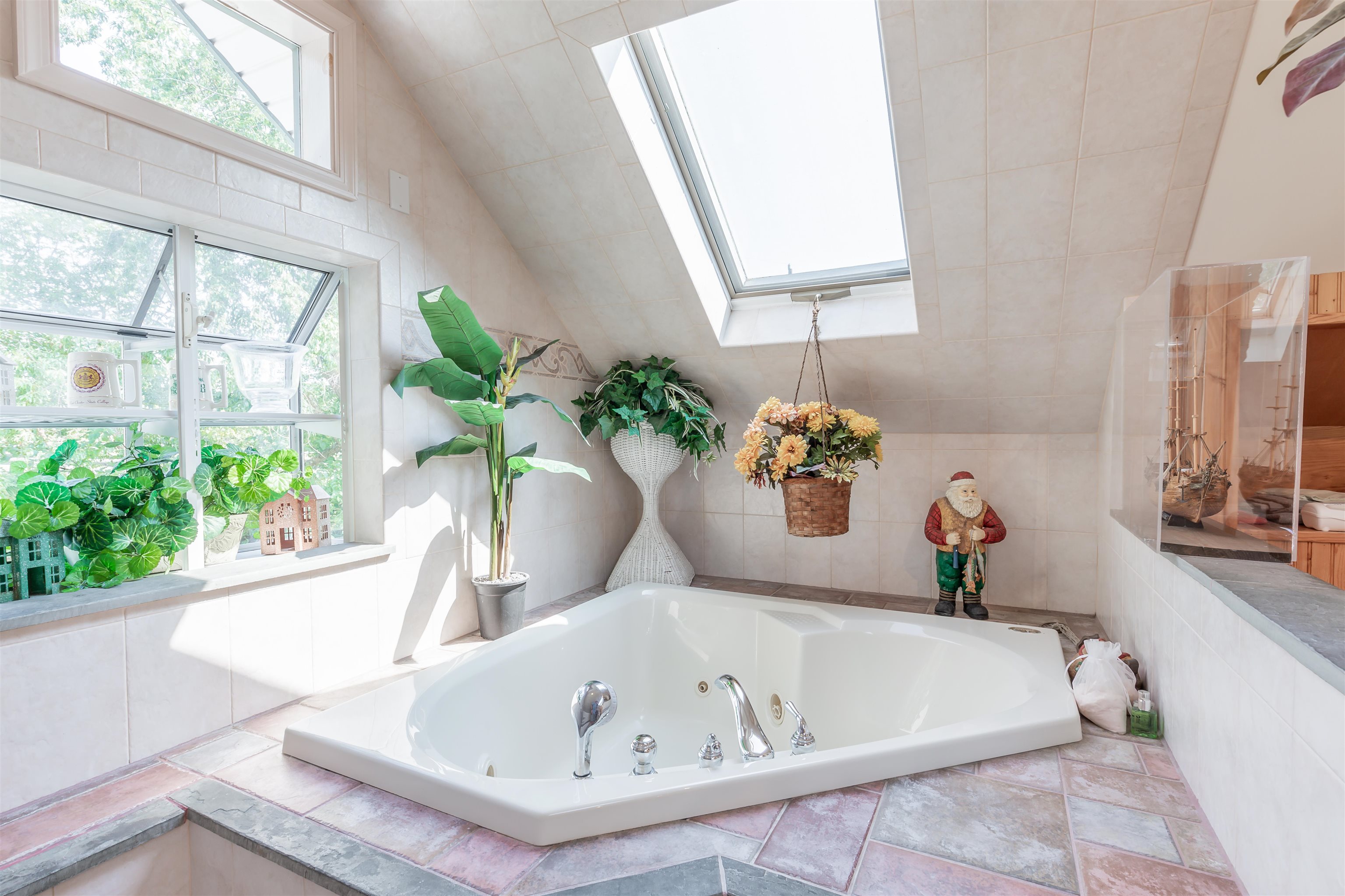1013 Seashore Road Cape May, NJ 08204 - Photo 33 of 44 a white bath tub sitting in a bathroom next to a window