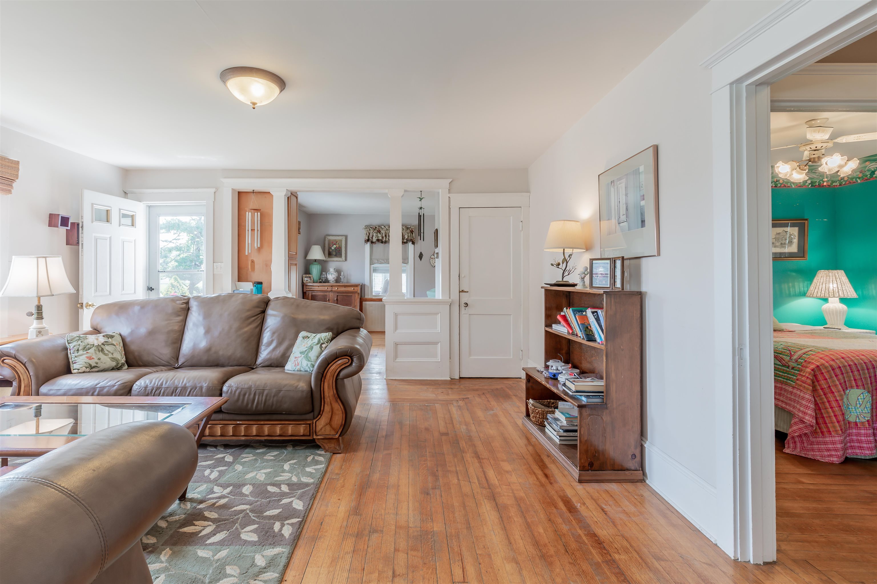 1013 Seashore Road Cape May, NJ 08204 - Photo 5 of 44 a living room with furniture and a wooden floor