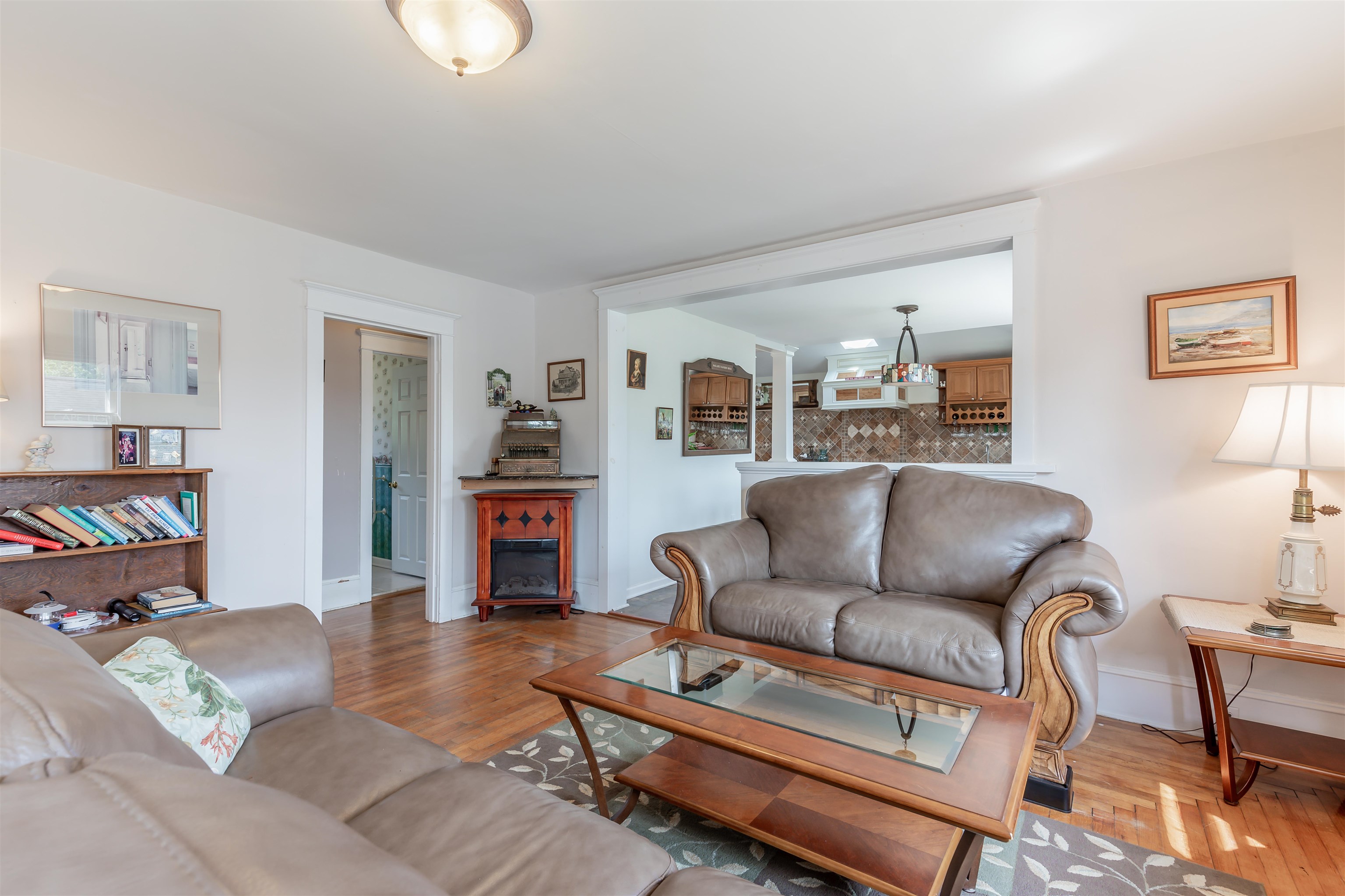 1013 Seashore Road Cape May, NJ 08204 - Photo 6 of 44 a living room with furniture and a wooden floor
