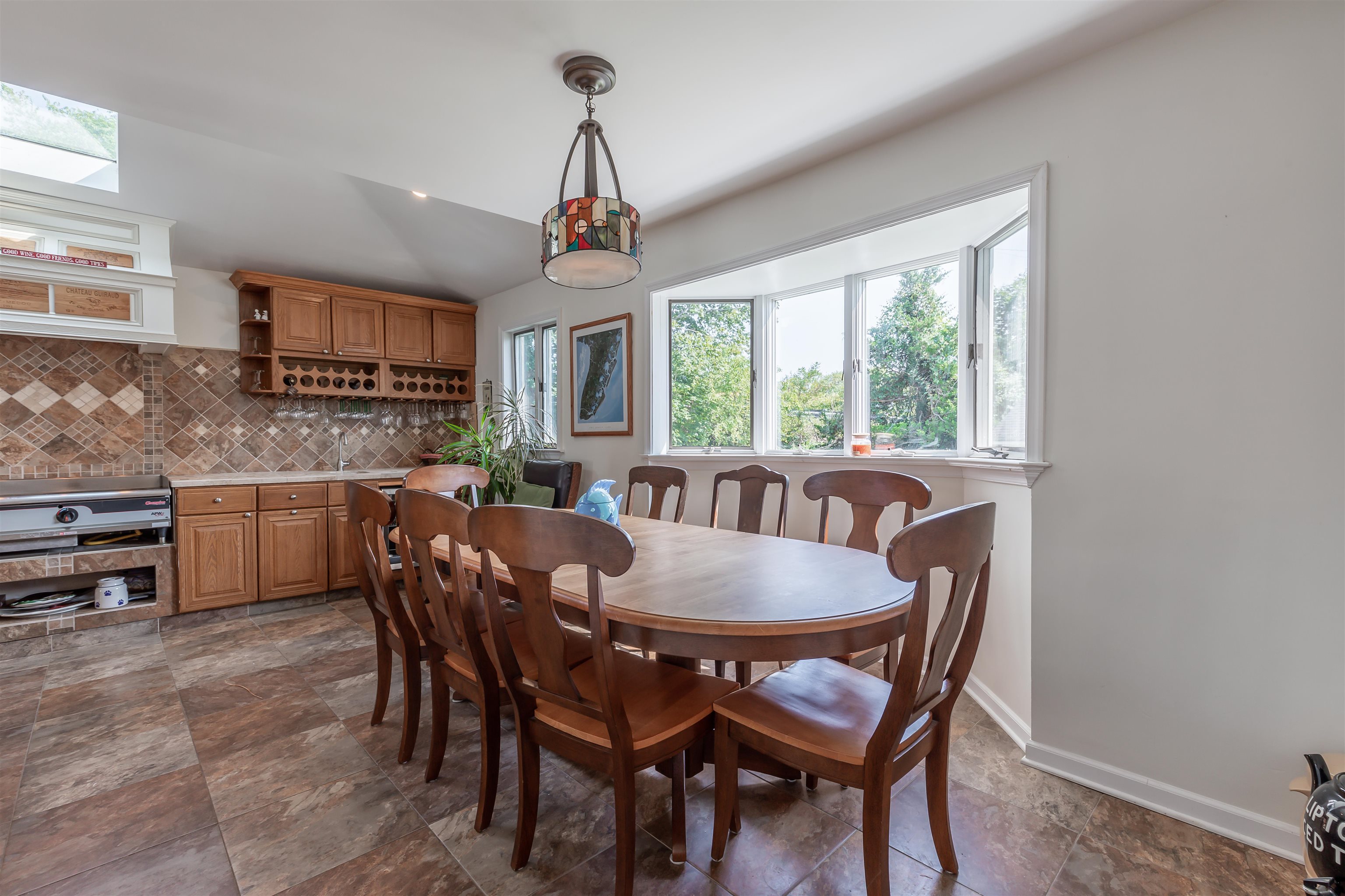 1013 Seashore Road Cape May, NJ 08204 - Photo 10 of 44 a view of a dining room with furniture window and outside view