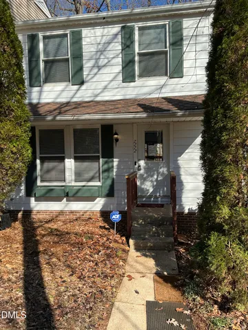 a front view of a house with patio