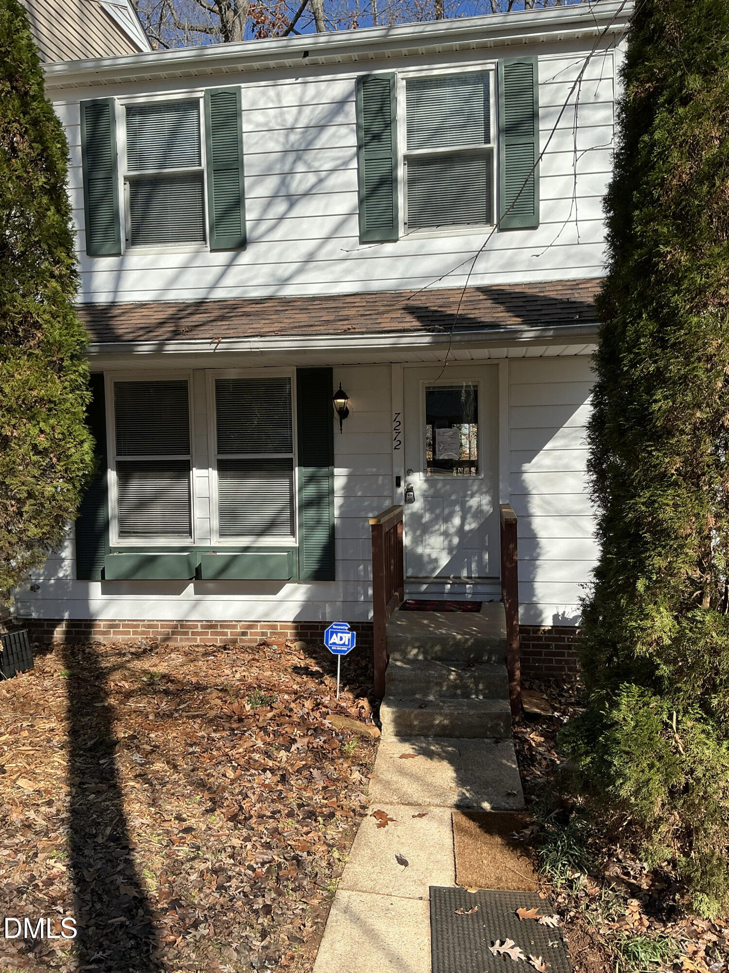 a front view of a house with patio