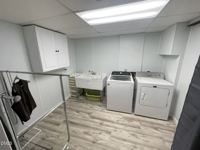 an entryway with a rug