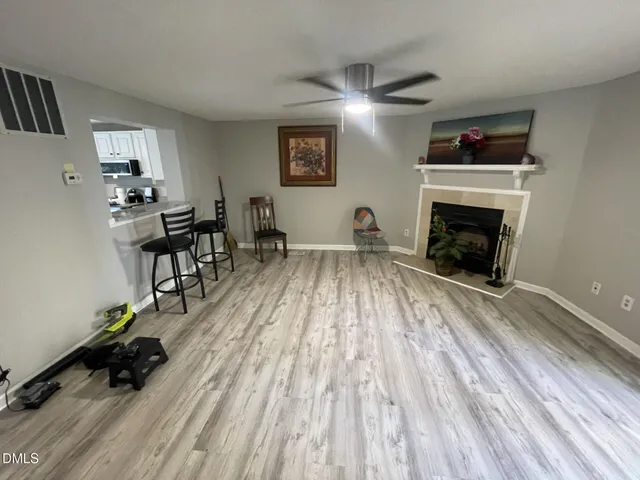 a view of balcony with wooden floor