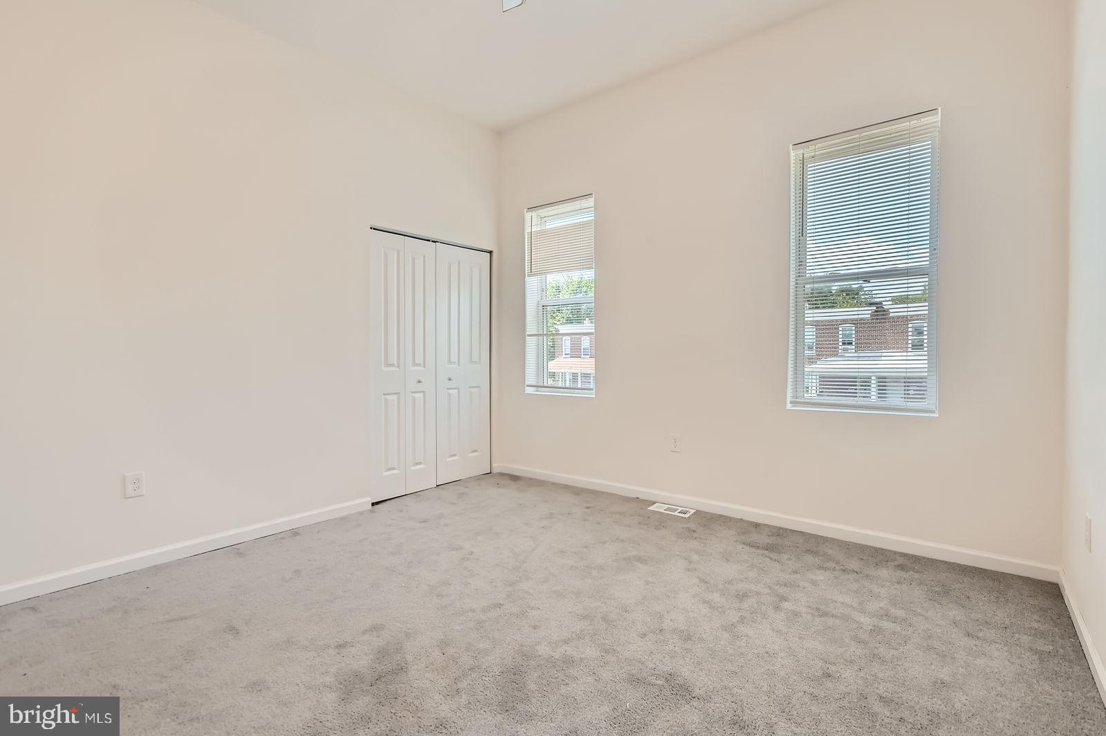 3617 Manchester Avenue Baltimore, MD 21215 - Photo 15 of 28 an empty room with windows