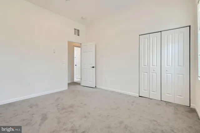 a bathroom with a sink vanity and mirror
