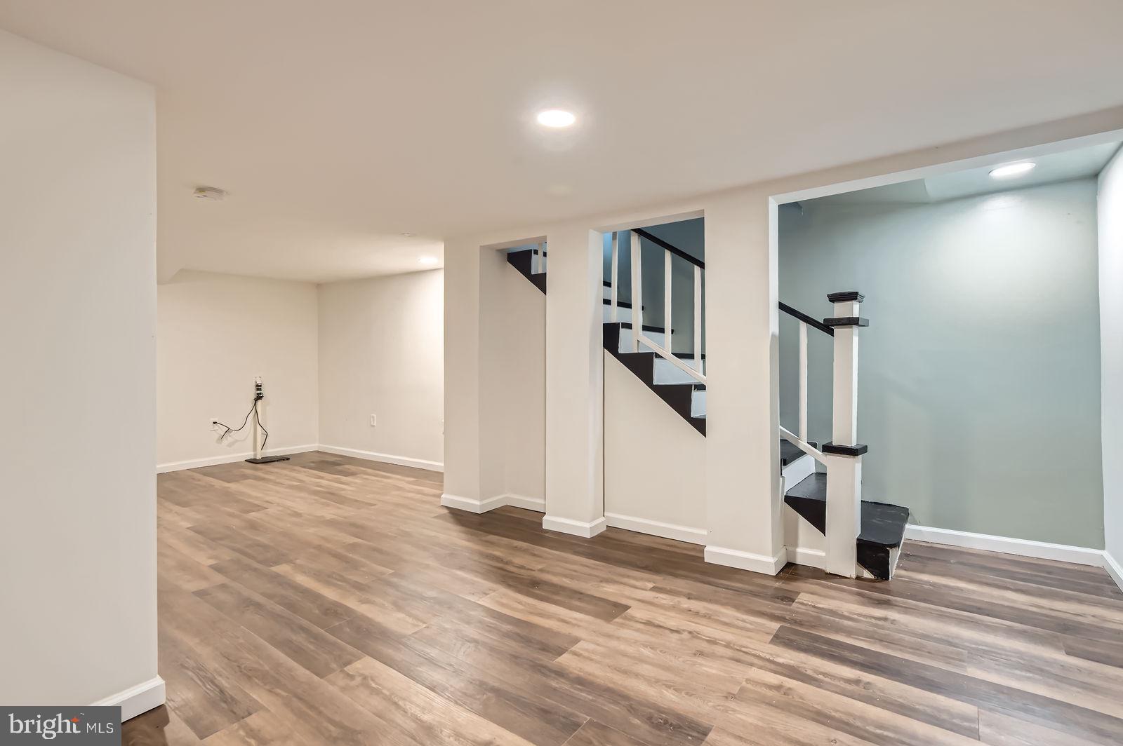 3617 Manchester Avenue Baltimore, MD 21215 - Photo 21 of 28 a view of empty room with wooden floor