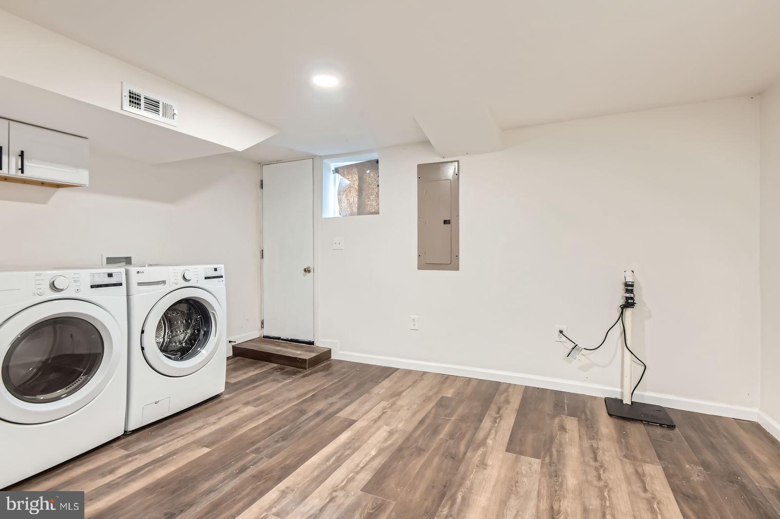 3617 Manchester Avenue Baltimore, MD 21215 - Photo 22 of 28 a view of a room with wooden floor and white walls