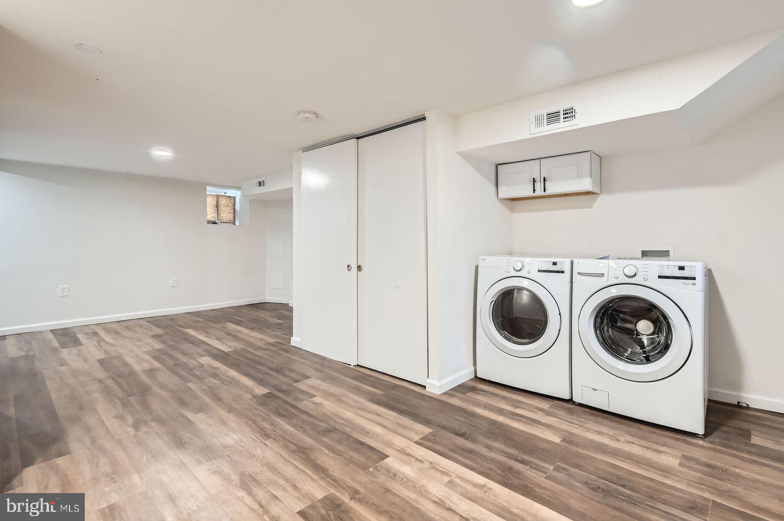 3617 Manchester Avenue Baltimore, MD 21215 - Photo 23 of 28 a view of a storage & utility room with washer and dryer