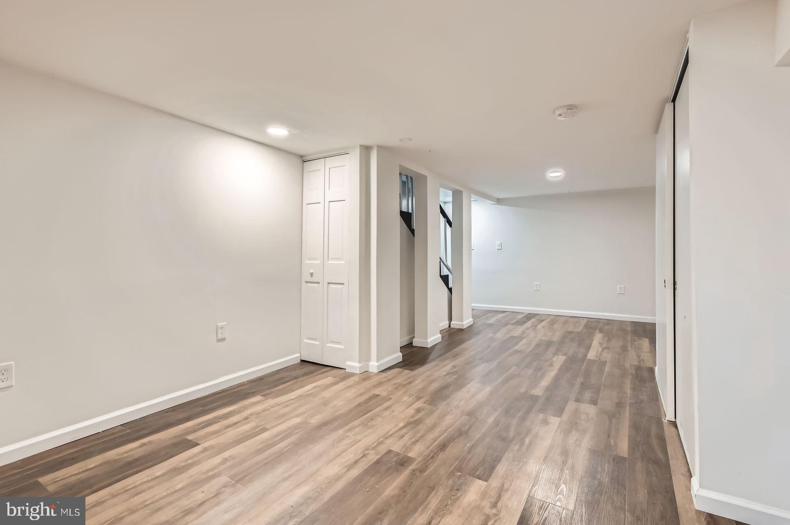 3617 Manchester Avenue Baltimore, MD 21215 - Photo 24 of 28 a view of empty room with wooden floor