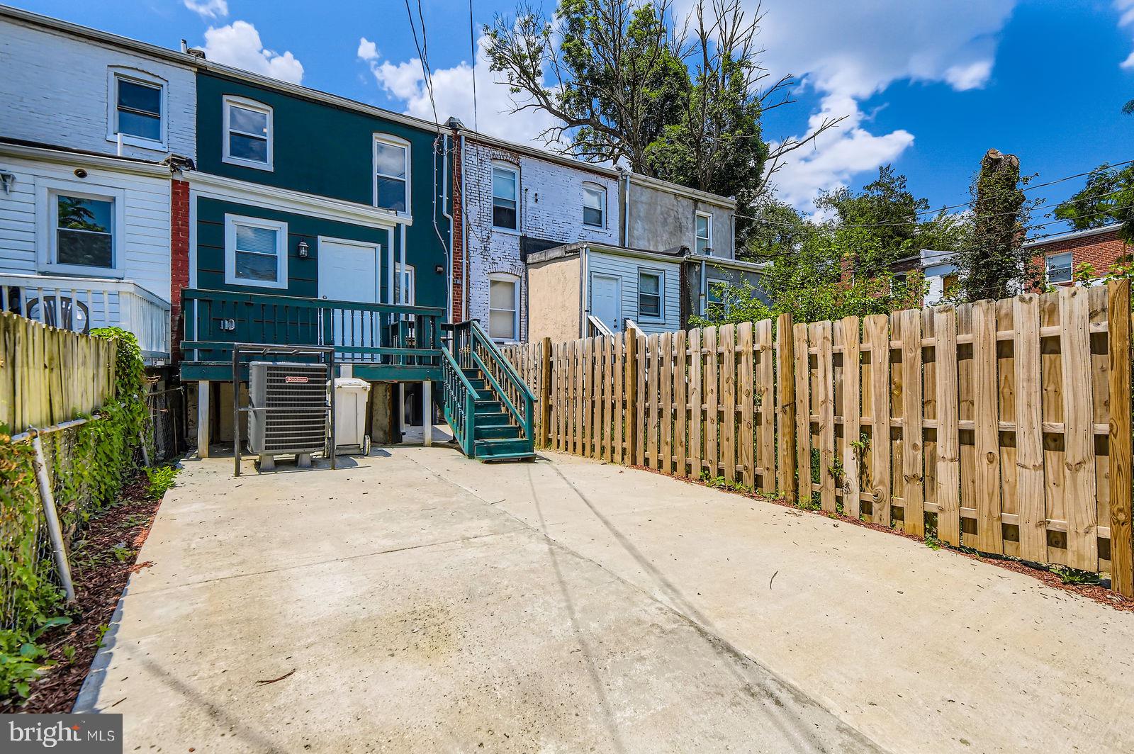 3617 Manchester Avenue Baltimore, MD 21215 - Photo 28 of 28 a view of a house with a wooden fence
