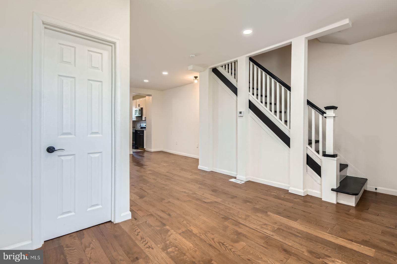 3617 Manchester Avenue Baltimore, MD 21215 - Photo 7 of 28 a view of entryway and hall with wooden floor