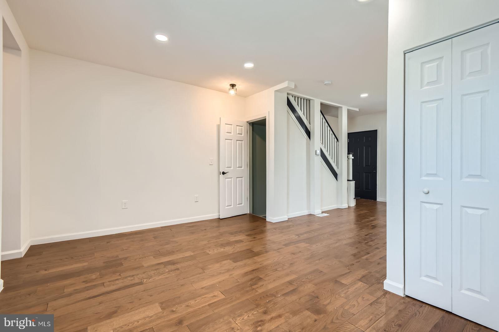 3617 Manchester Avenue Baltimore, MD 21215 - Photo 10 of 28 a view of an empty room with wooden floor