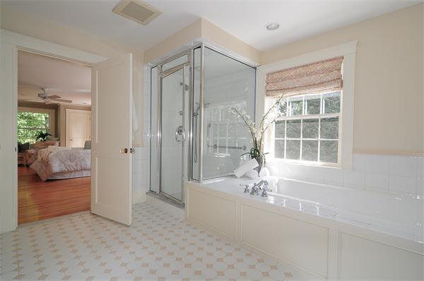 12 Tappan Road Wellesley, MA 02482 - Photo 13 of 18 a bathroom with a tub shower and sink