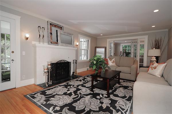 12 Tappan Road Wellesley, MA 02482 - Photo 2 of 18 a living room with furniture and a fireplace