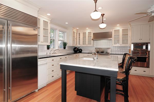 12 Tappan Road Wellesley, MA 02482 - Photo 6 of 18 a kitchen with kitchen island a sink stove and refrigerator