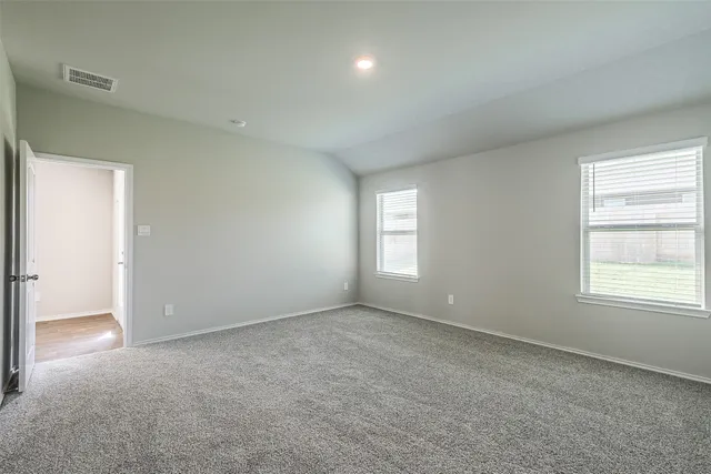 an empty room with windows