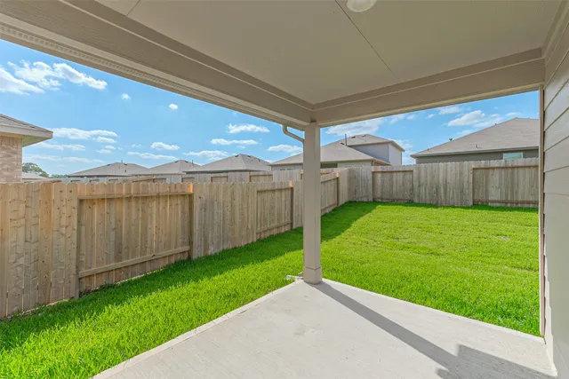 a view of a backyard with a garden