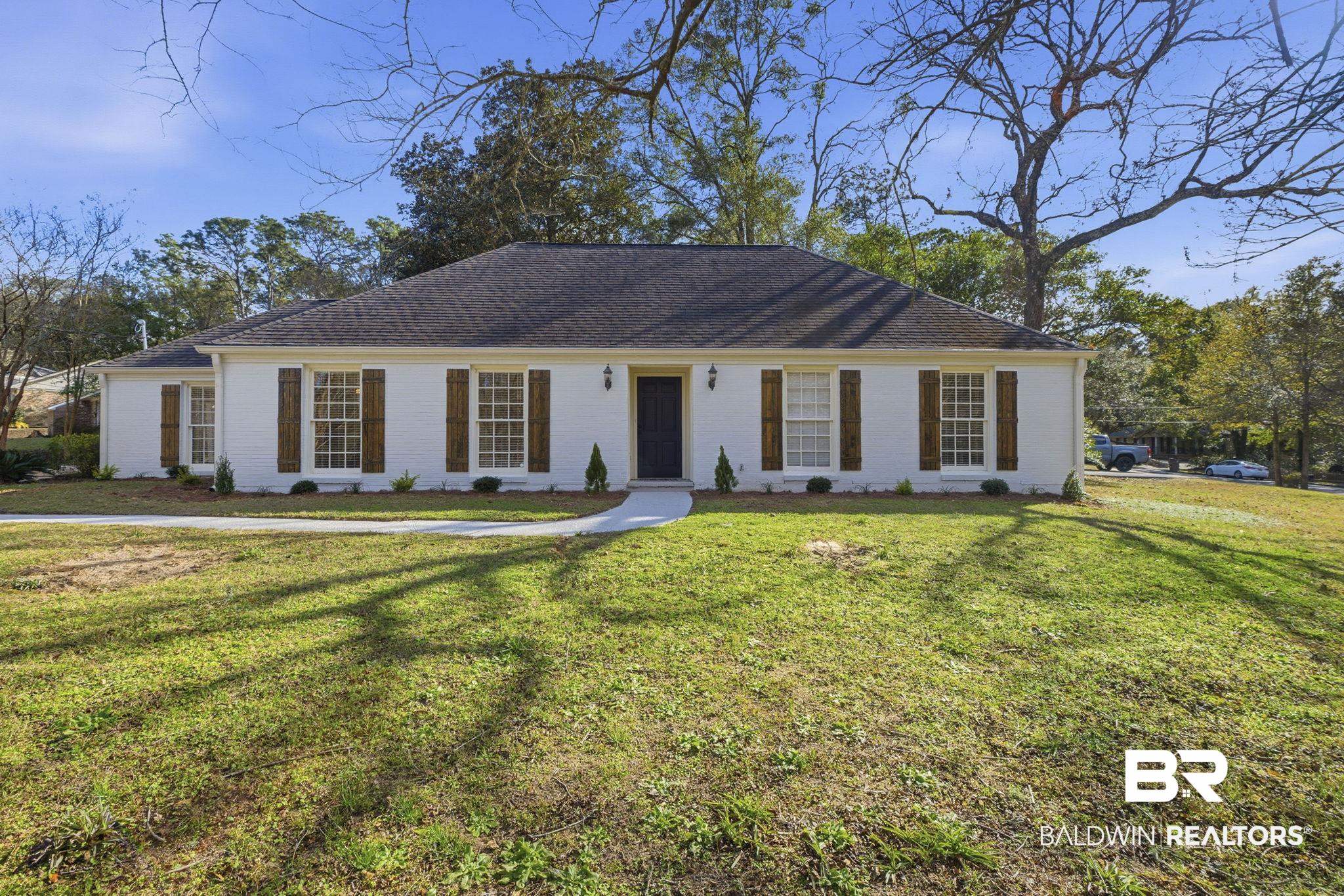 814 Nassau Drive Mobile, AL 36608 - Photo 1 of 44 Ranch-style house with a front lawn and brick siding