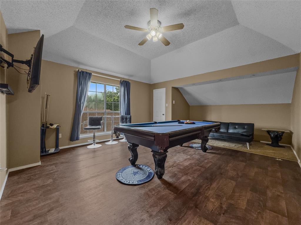 2317 Wellesly Road Rowlett, TX 75089 - Photo 23 of 39 a room with furniture and a window
