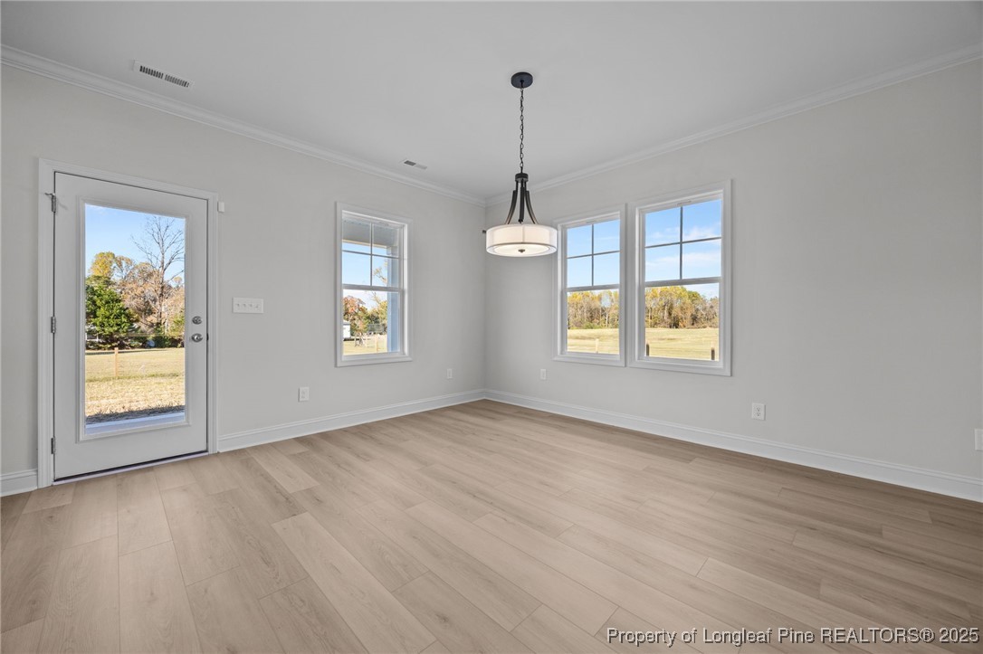 3162 Cameron Hill Road Cameron, NC 28326 - Photo 14 of 45 a view of an empty room with window and wooden floor