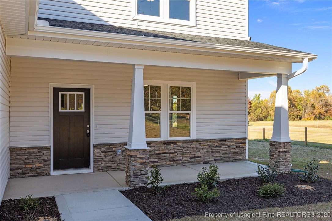 3162 Cameron Hill Road Cameron, NC 28326 - Photo 3 of 45 a front view of a house with a yard