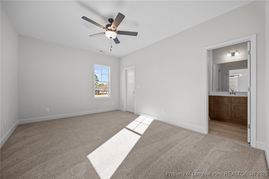3162 Cameron Hill Road Cameron, NC 28326 - Photo 32 of 45 a view of an empty room and a window