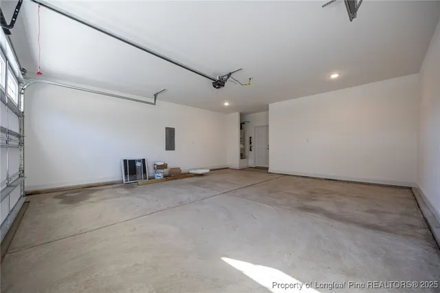 a view of a livingroom with a ceiling fan and window
