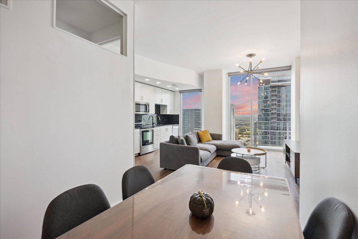 360 Nueces Street, Unit 2704 Austin, TX 78701 - Photo 14 of 40 a living room with furniture and a large window