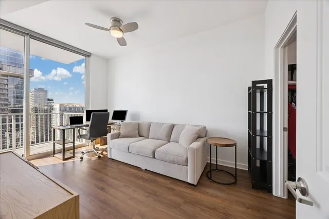 a view of a workspace with furniture