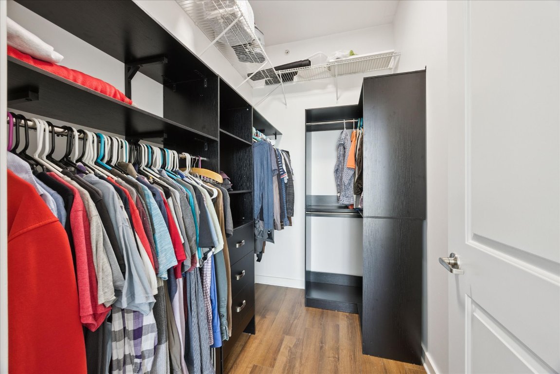 360 Nueces Street, Unit 2704 Austin, TX 78701 - Photo 23 of 40 a view of walk in closet with clothes and shoes