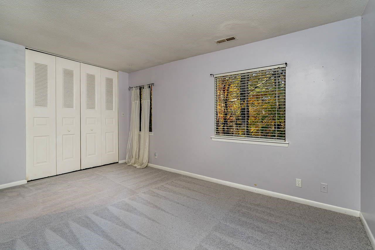 3080 Colony Road, Unit 3080E Durham, NC 27705 - Photo 24 of 31 a view of an empty room with a window