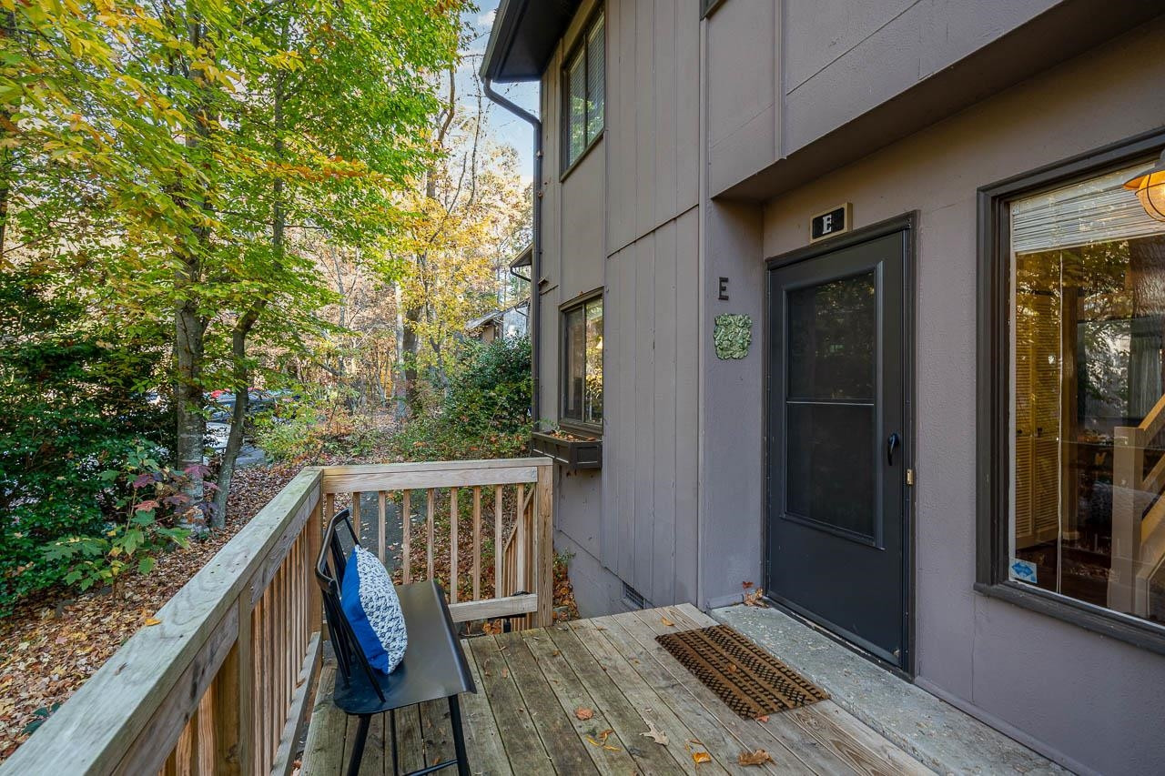 3080 Colony Road, Unit 3080E Durham, NC 27705 - Photo 27 of 31 a balcony with wooden floor and outdoor space