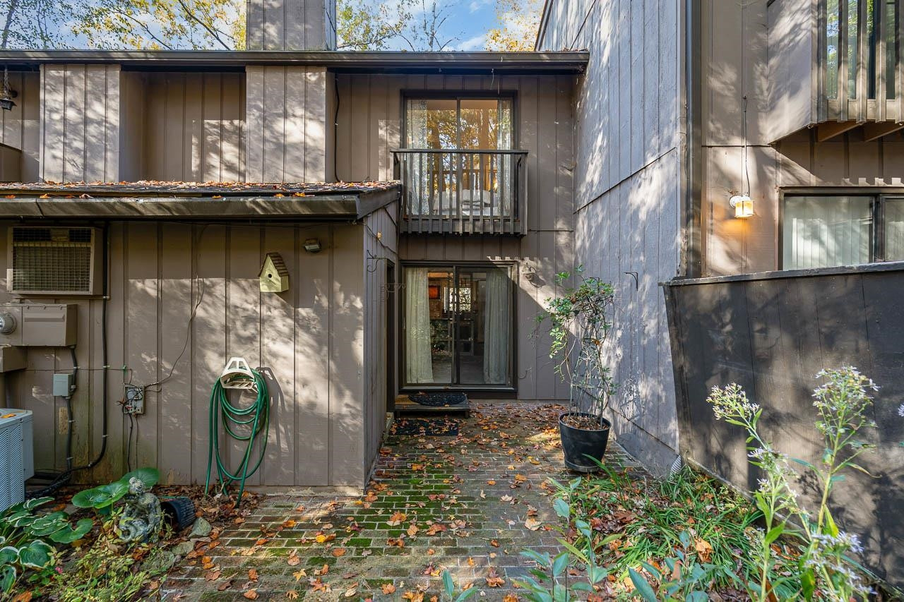 3080 Colony Road, Unit 3080E Durham, NC 27705 - Photo 30 of 31 a front view of a house with garden