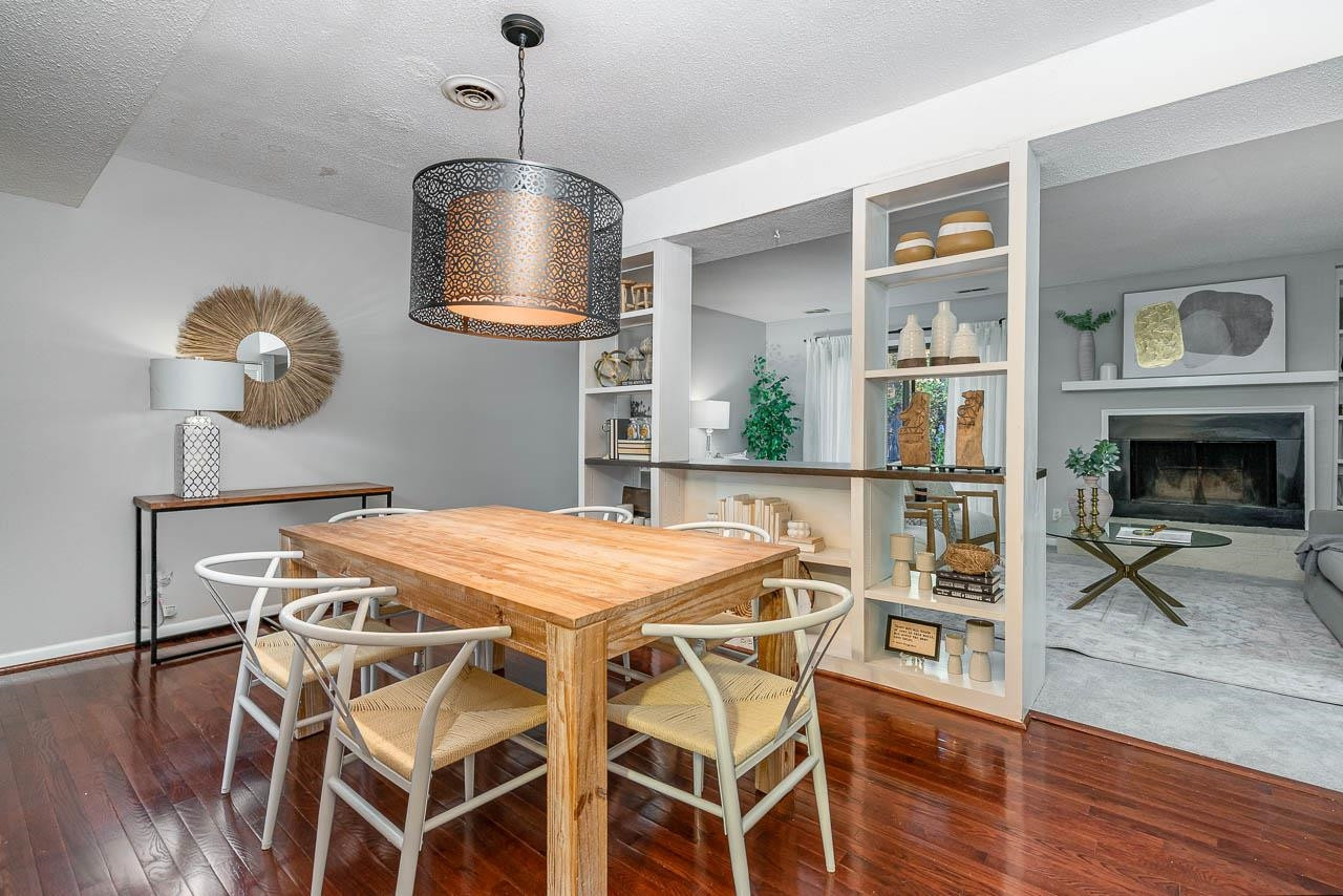 3080 Colony Road, Unit 3080E Durham, NC 27705 - Photo 9 of 31 a dining room with furniture and window