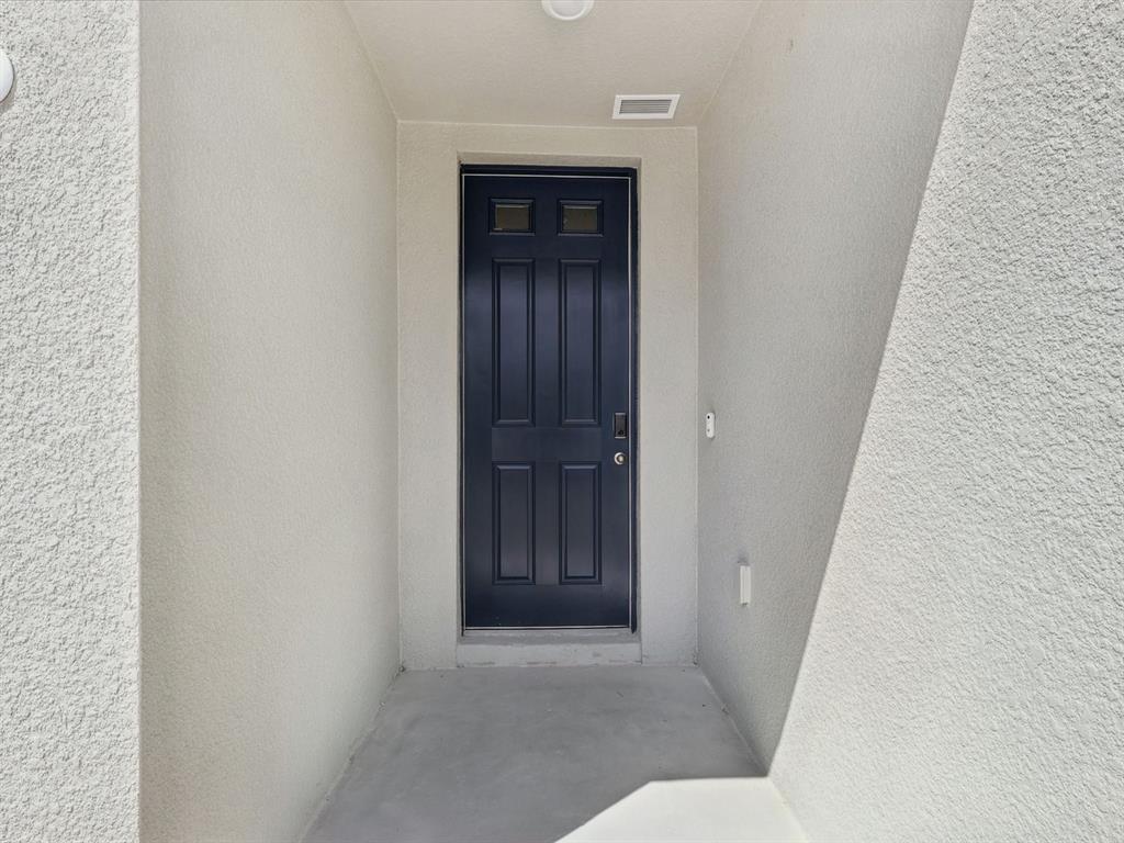 1646 Bark Rdg Drive Auburndale, FL 33823 - Photo 4 of 34 a view of entryway with wooden floor
