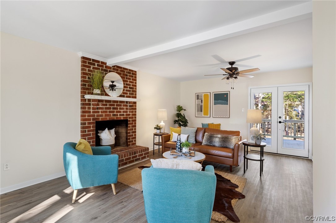 10618 Timberun Road Chesterfield, VA 23832 - Photo 5 of 30 a living room with furniture and a fireplace