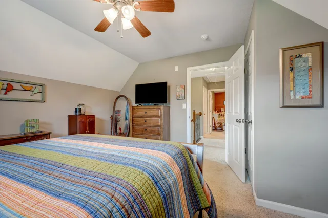 a view of a large yard with lots of green space