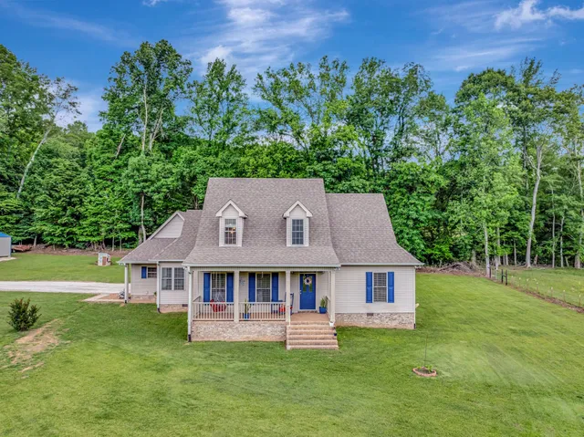 a backyard of a house with lots of green space