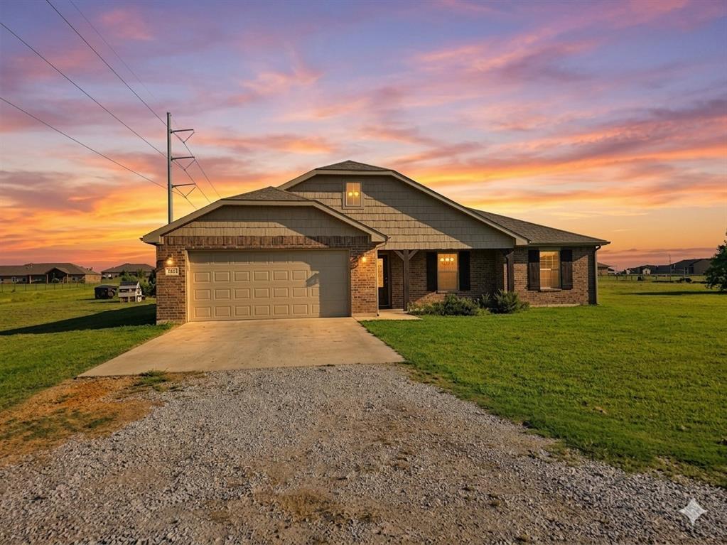 132 County Road 4213 Decatur, TX 76234 - Photo 2 of 27 a front view of a house with a yard