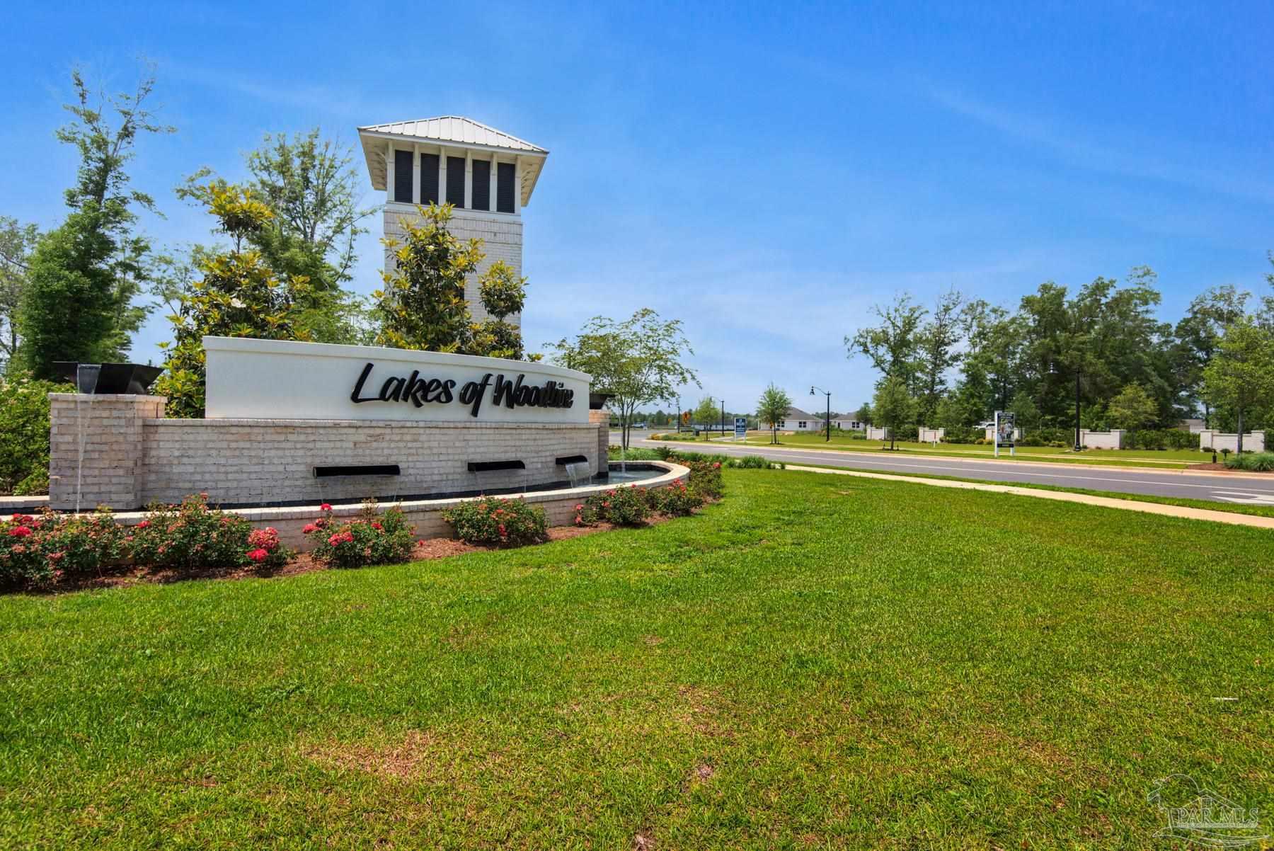 4639 Eider Road Pace, FL 32571 - Photo 2 of 27 a view of a house with a swimming pool